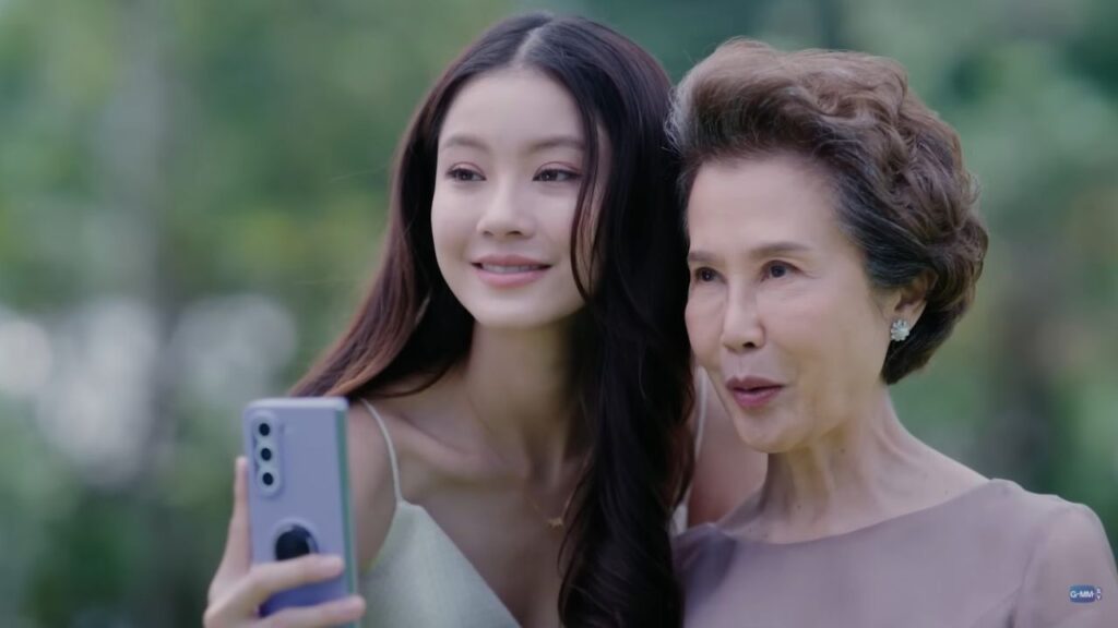 Ob‑oom from Pluto Thai TV Series recovering and acknowledging Ai‑oon and May’s connection, embodying hope and redemption.