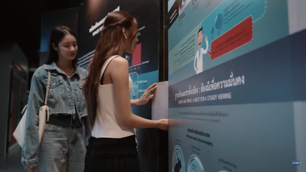 May from Pluto Thai TV Series gently exploring her surroundings, highlighting honest visual impairment portrayal.