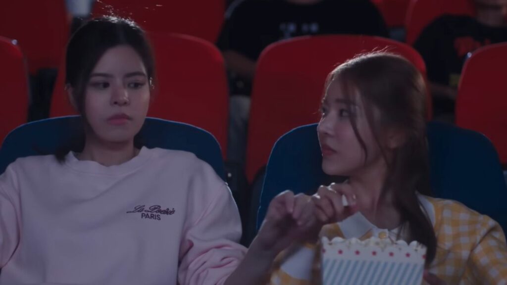 Scene from Somewhere Somehow featuring the main couple, emphasizing the intertwined stories.