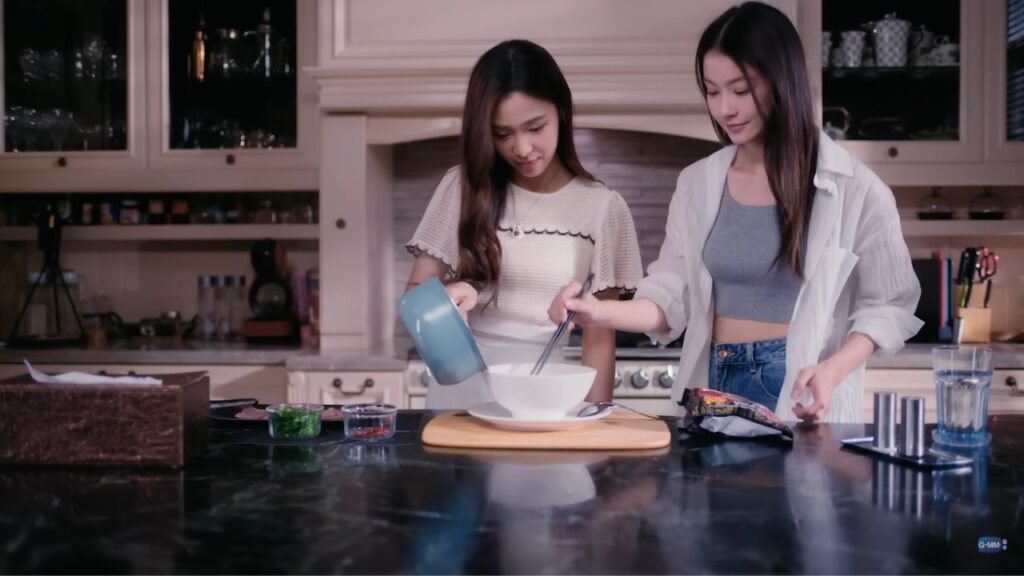 Scene from Pluto, a Thai GL series, portraying emotional intimacy and connection between two women.