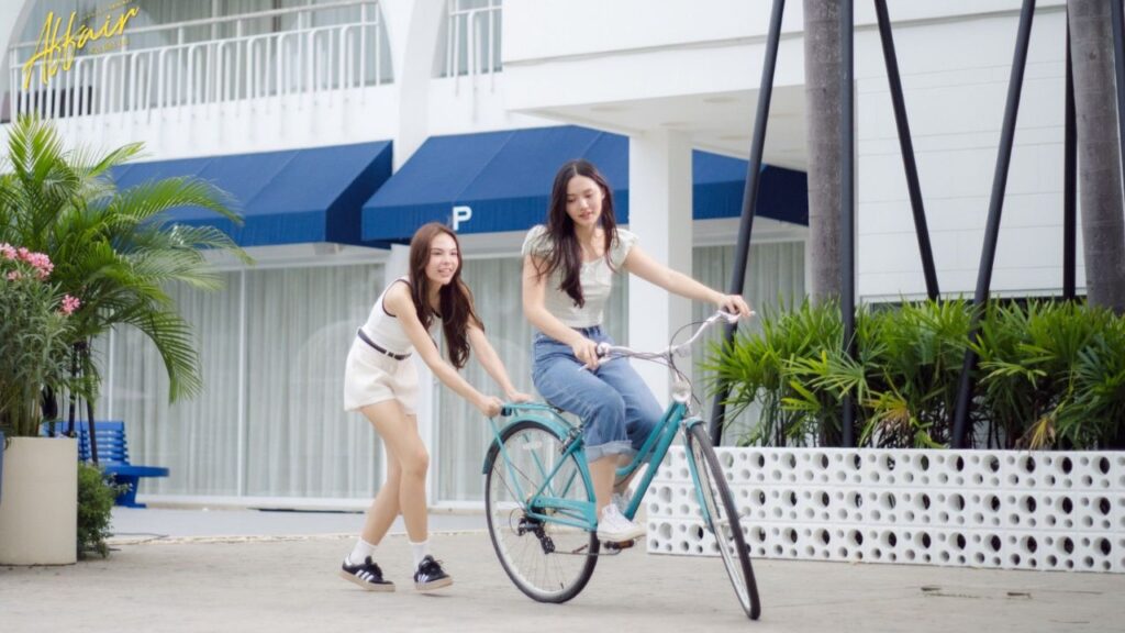 Scene from Affair, a Thai GL Series, capturing queer joy and mutual support between women.