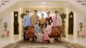 Family portrait scene from The Loyal Pin, symbolizing tradition and societal expectations in 1950s Thailand.
