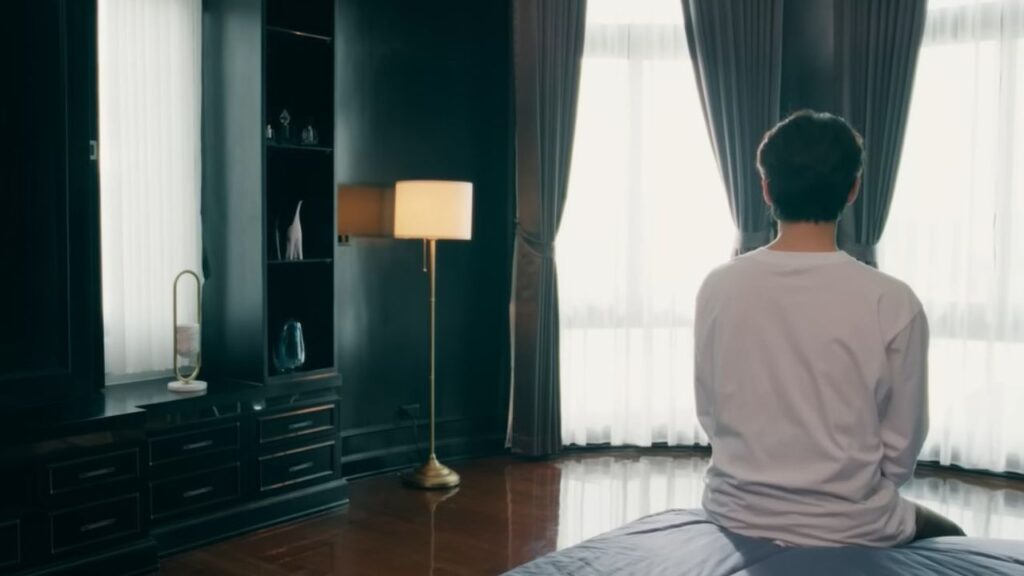 Scene set inside the family house in US, representing the emotional pressure and identity struggle faced by the siblings.